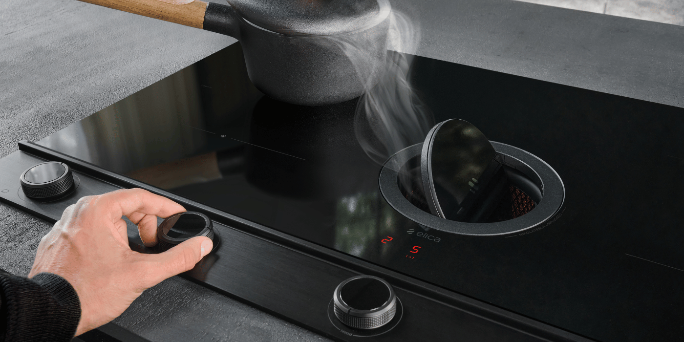 Induction hobs with extractor